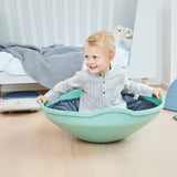 The Mini Top invites young children to teeter, swing and spin around