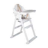 This white all wood highchair folds flat easily for storage in your home and includes a full safety harness to keep your little one safe.