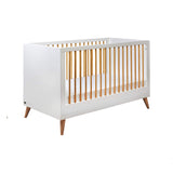 The cot bed has 3 adjustable heights, allowing you to change the height of the mattress.