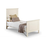 Cot bed converts into a bed when baby becomes toddler with matching furniture to  last years when toddler becomes child.