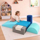 Blue and grey toddler soft play climbing blocks with 18-month-old child