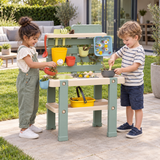 Outdoor mud kitchen with working water tap and accessories
