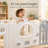 Baby exploring the smooth white HDPE panel of the car-themed playpen