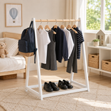 Child-height open wardrobe with children’s clothes and shoes