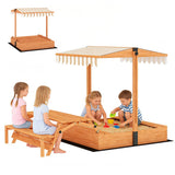 Wooden sandpit picnic table with canopy in garden