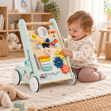 Baby girl playing with wooden activity walker and colourful spinning gears