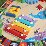 Little Helpers Montessori Busy Board -pöytä, jossa on seitsemän aktiviteettia