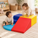 Two toddlers exploring the steps and ramp of a four-piece indoor soft play set
