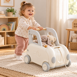 4-in-1 toddler push walker and ride-on train with toy storage in white and grey
