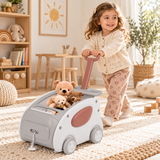 Three year old girl pushing Montessori walker cart in neutral playroom