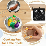 Children's cooking set with toy stovetops and vegetables on a wooden surface, featuring a chalkboard for menu.