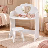 White children’s dressing table with heart mirror and round stool in a neutral bedroom