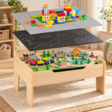 Wooden train table with a cameo showing the chalkboard panel and building baseplate.