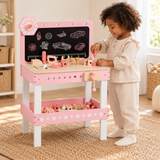 Pink wooden kids’ tool bench with blackboard and toy tools