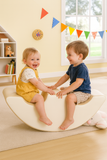 Large 2 Seater Autism-Friendly Pikler Ride On |  Eco Leather Fabric with 2 happy children rocking