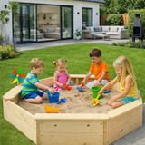 Large octagonal sandpit in a garden with children playing