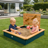 children playing with outdoor sand pit sensory wall