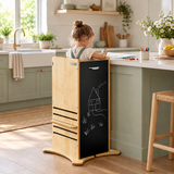 Three-year-old girl baking in a height-adjustable FunPod kitchen tower