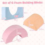 Cushioned soft play climbing shapes for an indoor playroom
