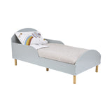 Low toddler bed with natural wood legs