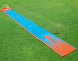 Children sliding along a 4.88m outdoor water slide