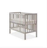 Modern compact cot in grey finish for babies