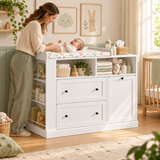 White baby changing unit with two drawers and integrated laundry basket