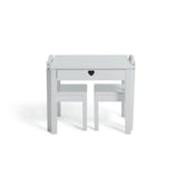 A close up of the childrens desk from this white wooden kids table and chairs set