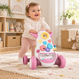 Pink Montessori baby walker with 10-month-old girl learning to walk
