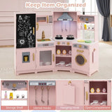 child playing with corner toy kitchen pink — role playing