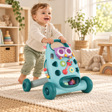 One year old boy learning to walk with blue Montessori baby push walker