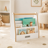 Mini white children’s bookcase beside toddler bed
