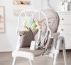 Foldable grey highchair with dishwasher-safe tray and five-point safety harness