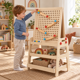 Child playing with the marble run on a 2-in-1 wooden art easel