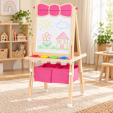 Pink wooden children’s easel with height adjustable magnetic whiteboard and two storage boxes