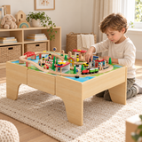 Four-year-old playing with a wooden train table in a neutral Little Helper playroom.