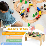 Magnetic fishing area beside the wooden railway tracks on the children’s activity table.