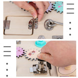 This busy board includes locks, keys, laces, cogs and more