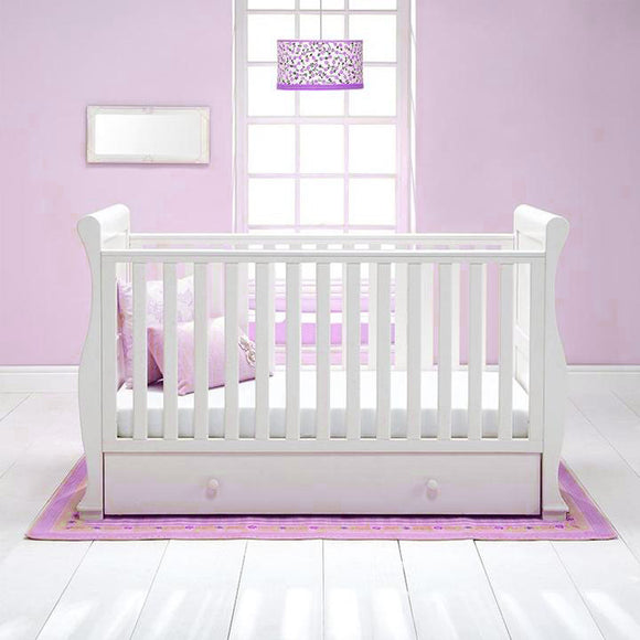 This 4-in-1 warm white Sleigh Cot Bed with Drawer is a beautiful Wooden Cot, Toddler Bed and day bed