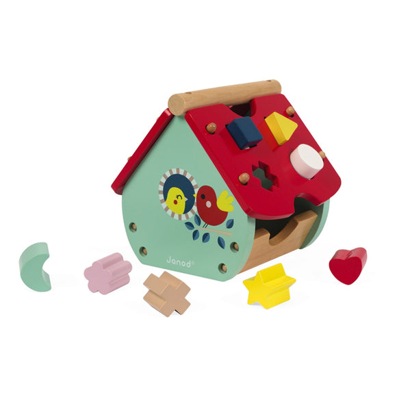 This colourful shape sorter wooden house with clock dial is ideal for learning colours and shapes and introducing time.