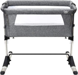 This modern soft grey bedside baby crib is perfect for new parents