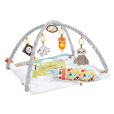 Extra-large, machine-washable play mat with plush llama and tummy wedge