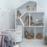 Stunning white dollhouse bookcase for play and storage
