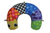 A multi-coloured cushion wraps gently around baby’s head