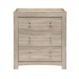 The dresser has an integral changing unit and three deep drawers to keep nappy-changing essentials close to hand.