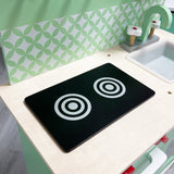 This super cute eco wooden toy kitchen comes with 2 hob rings, taps and dials with realistic sounds