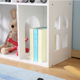 सफेद लकड़ी का खिलौना और किताबों का भंडारण