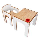 Juego de mesa y sillas infantiles Little Helper FunStation en color blanco, con un recipiente de plástico insertado en la parte superior del escritorio para lápices y crayones.