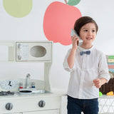 Se incluye el teléfono inalámbrico para que tu mini masterchef pueda tomar pedidos en su cocina de juguete montessori.
