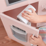 Water dispenser included on this super cool montessori wooden toy kitchen